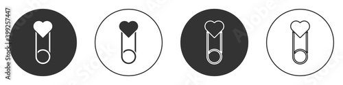 Black Baby clothes pin icon isolated on white background. Classic closed steel safety pin. Circle button. Vector.