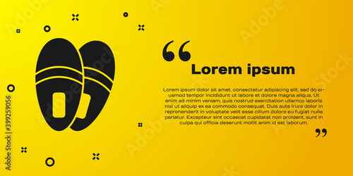 Black Slippers icon isolated on yellow background. Flip flops sign. Vector.