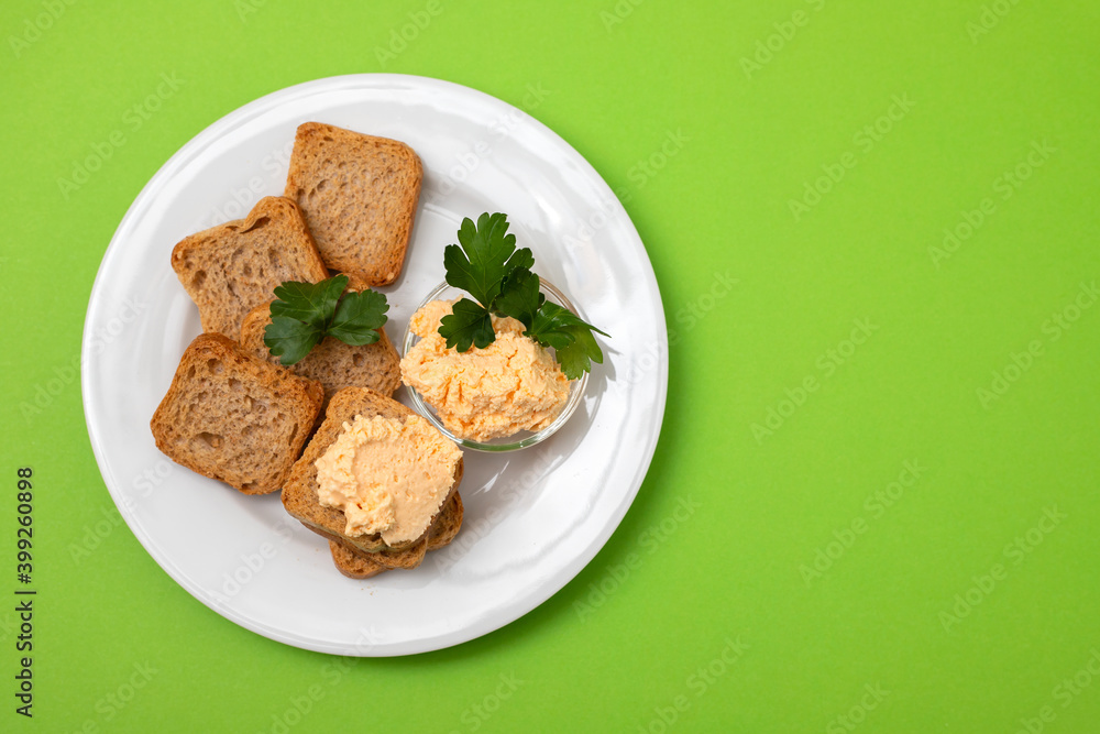 toasts with fish pate on white plate toasts with fish pate on white plate