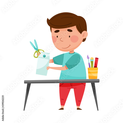 Creative Boy Crafting from Used Carton Package Vector Illustration