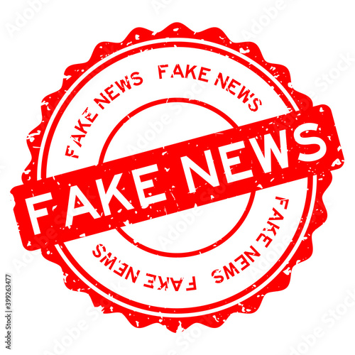 Grunge red fake news word round rubber seal stamp on white background