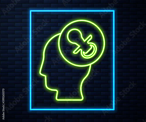 Glowing neon line Baby dummy pacifier icon isolated on brick wall background. Toy of a child. Vector.