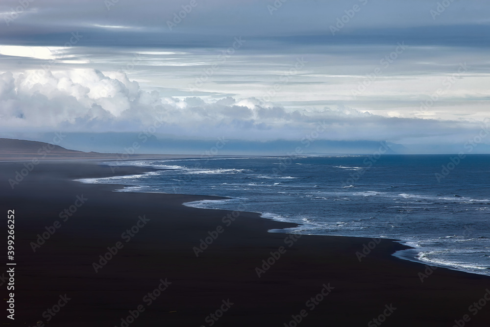 Black sand beach. Shore of the Atlantic ocean. Iceland. 