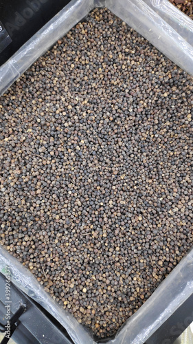 Dry peppercorn display on market photo