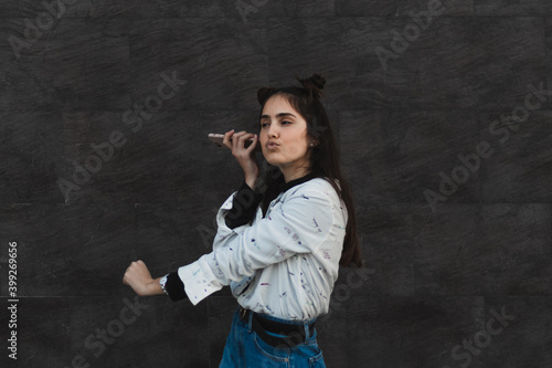 cute girl, attractive, young girl dancing and listening to music, entertainment concept