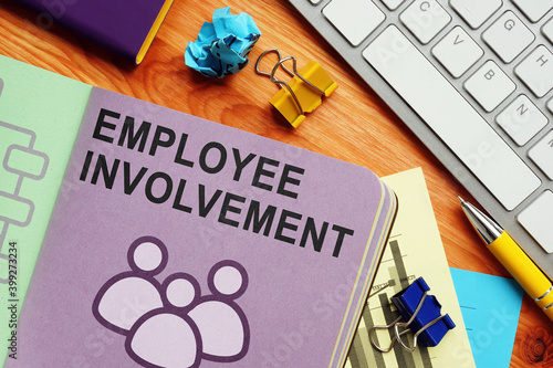 Employee Involvement data in the report on the desk.