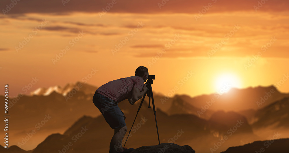 a photographer taking photos of wonderful sunset landscapes.