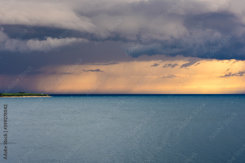 Heavy storm on the sea with a ship.