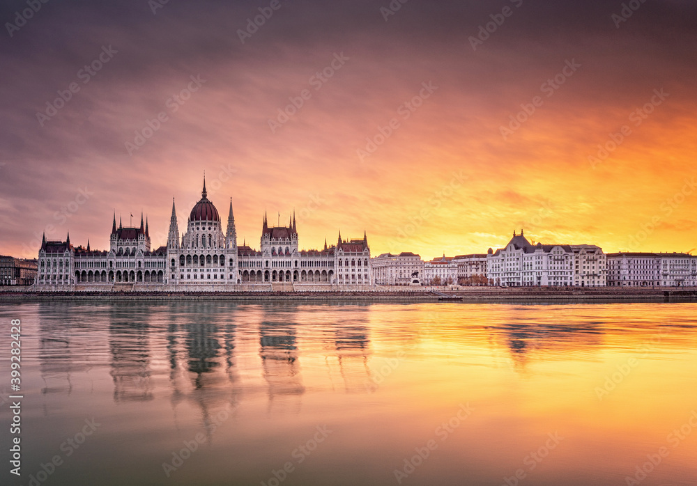 Wonderful sunset over the Hungarian Parliament in Budapest in winter Wonderful sunset over the Hungarian Parliament in Budapest in winter