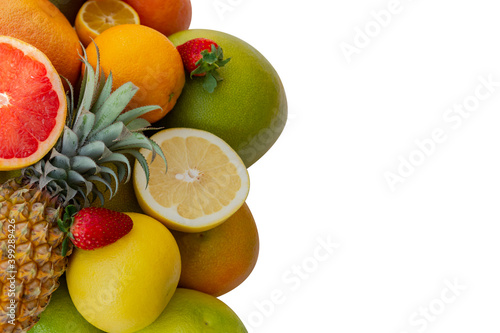 Bright fresh juicy tropical fruits isolated on white background. Copy space .