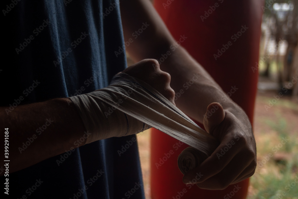Boxer wraping hands