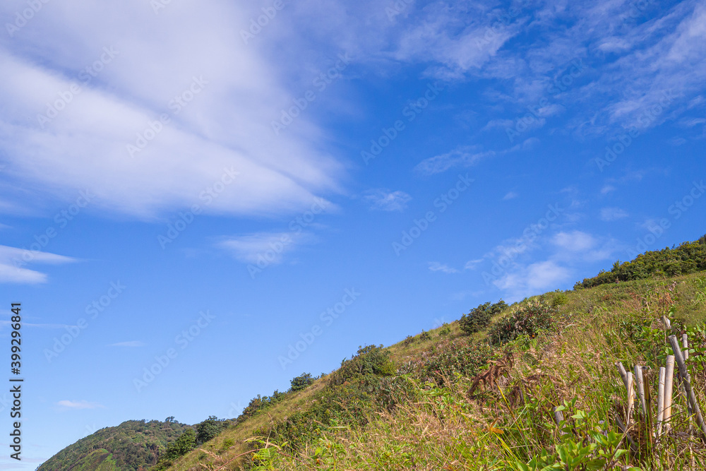 Beautiful scenic view of mountains and clouds against the sky in Kew Mae Pan nature trail at Doi Inthanon, Chiang Mai, Thailand. Famous tourist attractions of Thailand. Concept of holiday and travel Beautiful scenic view of mountains and clouds against the sky in Kew Mae Pan nature trail at Doi Inthanon, Chiang Mai, Thailand. Famous tourist attractions of Thailand. Concept of holiday and travel