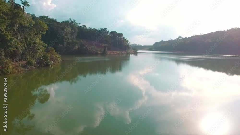 Mineral extraction lake in the middle of the Amazon rainforest by drone Mineral extraction lake in the middle of the Amazon rainforest by drone