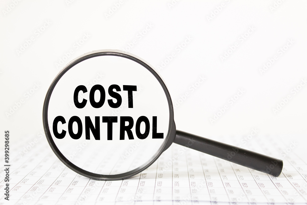 words COST CONTROL in a magnifying glass on a white background. business concept words COST CONTROL in a magnifying glass on a white background. business concept