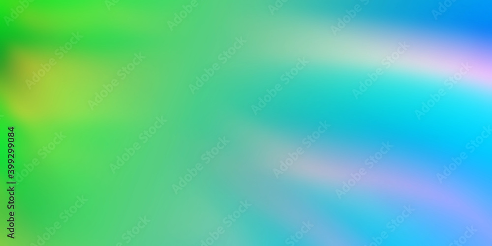 Blurred background with light green and blue colors.