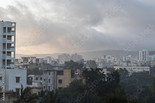 pune city on foggy early morning with layer of clouds and artistic looking fog