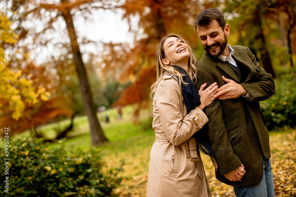 Young couple in the autumn park Young couple in the autumn park