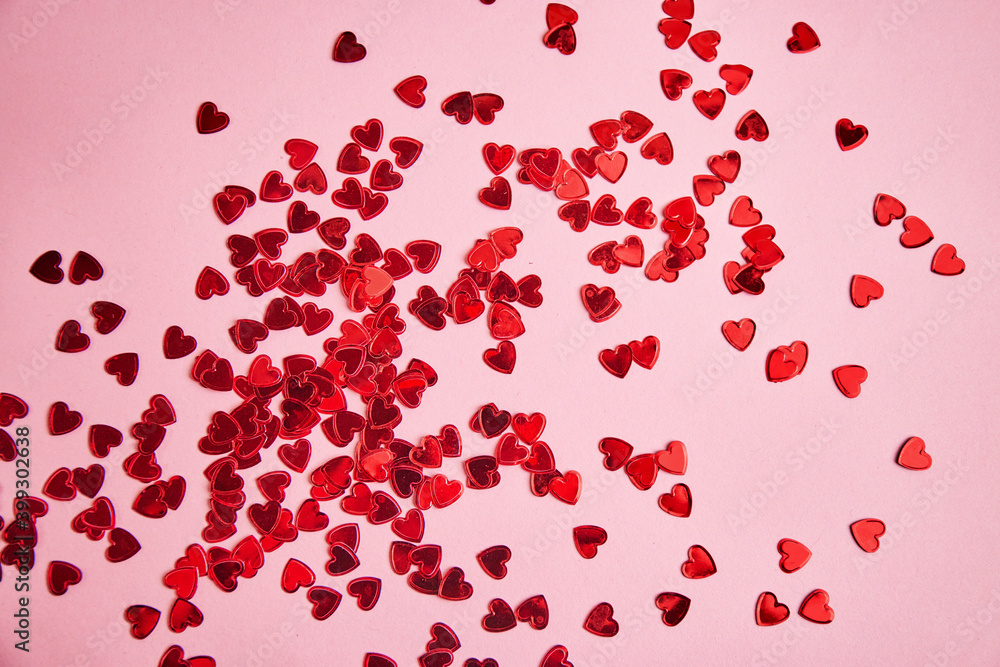 Valentine day background. Red hearts on pink background Valentine day background. Red hearts on pink background
