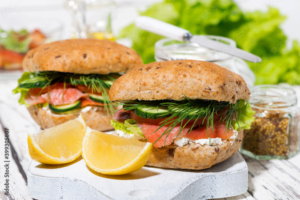 sandwich with salted fish and cream cheese on wooden board sandwich with salted fish and cream cheese on wooden board