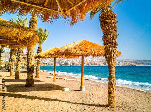 Fototapeta Naklejka Na Ścianę i Meble -  Morning on central public beach in Eilat - famous tourist resort and recreational city in Israel