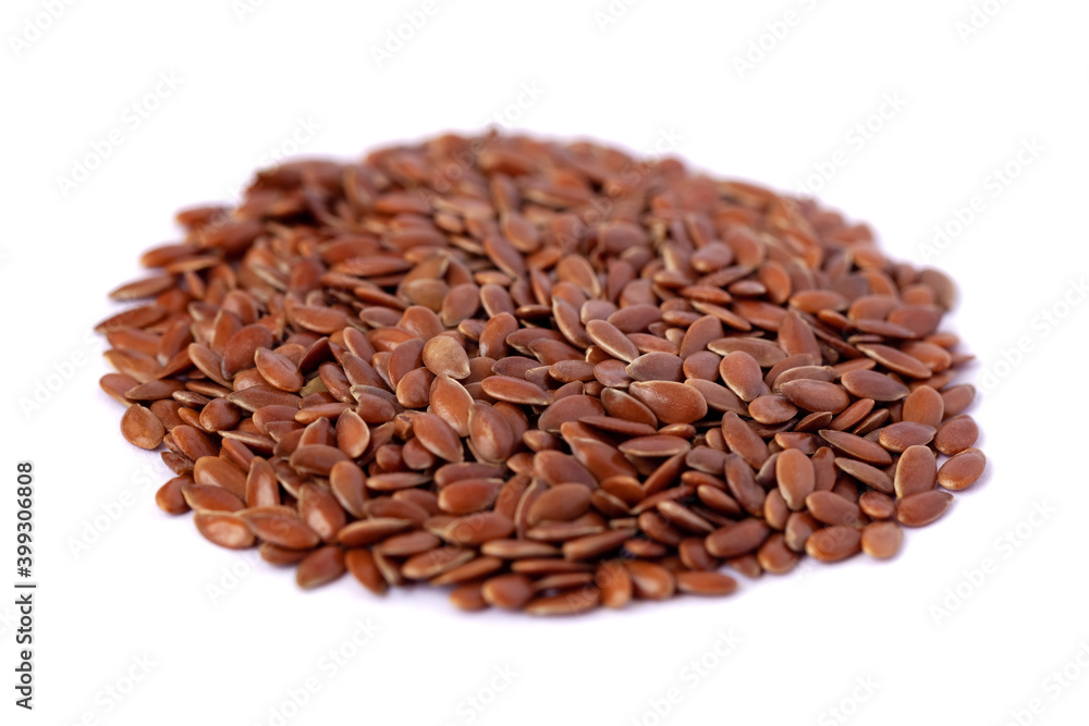 Close-up of flax seeds isolated on white background Close-up of flax seeds isolated on white background