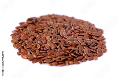 Close-up of flax seeds isolated on white background