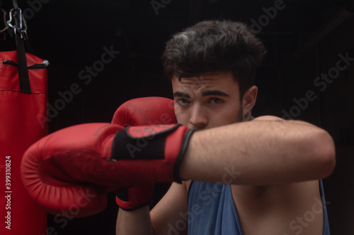 boxer with gloves hook 