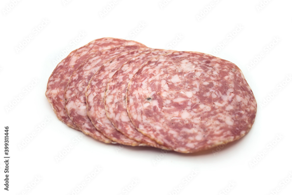 Closeup of sliced salami sausage on white background Closeup of sliced salami sausage on white background