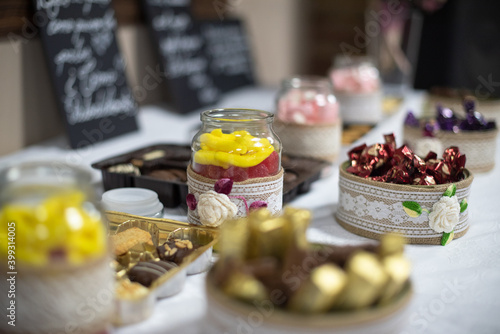 still life of sweets and chocolate on a table