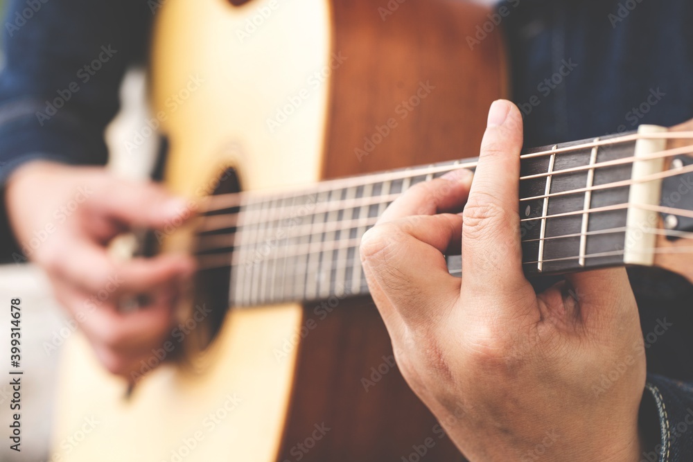 Fototapeta premium musician plays solo part on string instrument.