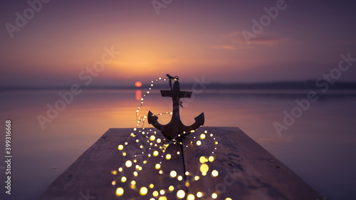 Fototapeta Naklejka Na Ścianę i Meble -  Anker in der Dämmerung am See