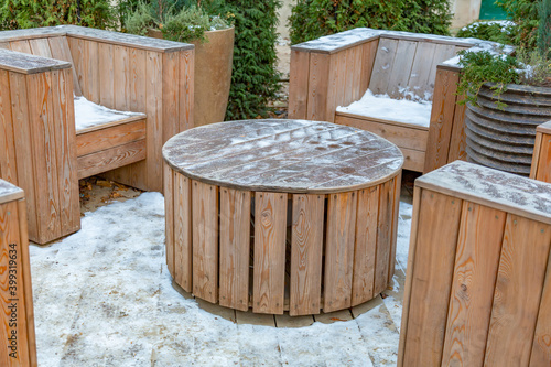 Handmade furniture made of wooden boards. Idea for landscaping the garden and backyard © ironstuffy