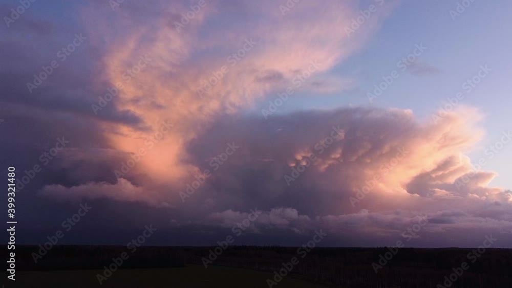 Autumn storm cloud mammatus time lapse from drone sunset light sky Autumn storm cloud mammatus time lapse from drone sunset light sky