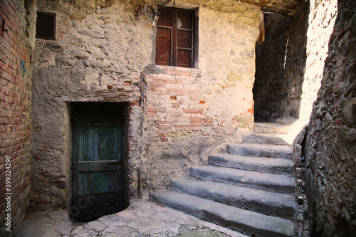 Narrow alley in the village of Passignano on Lake Trasimeno  Italy