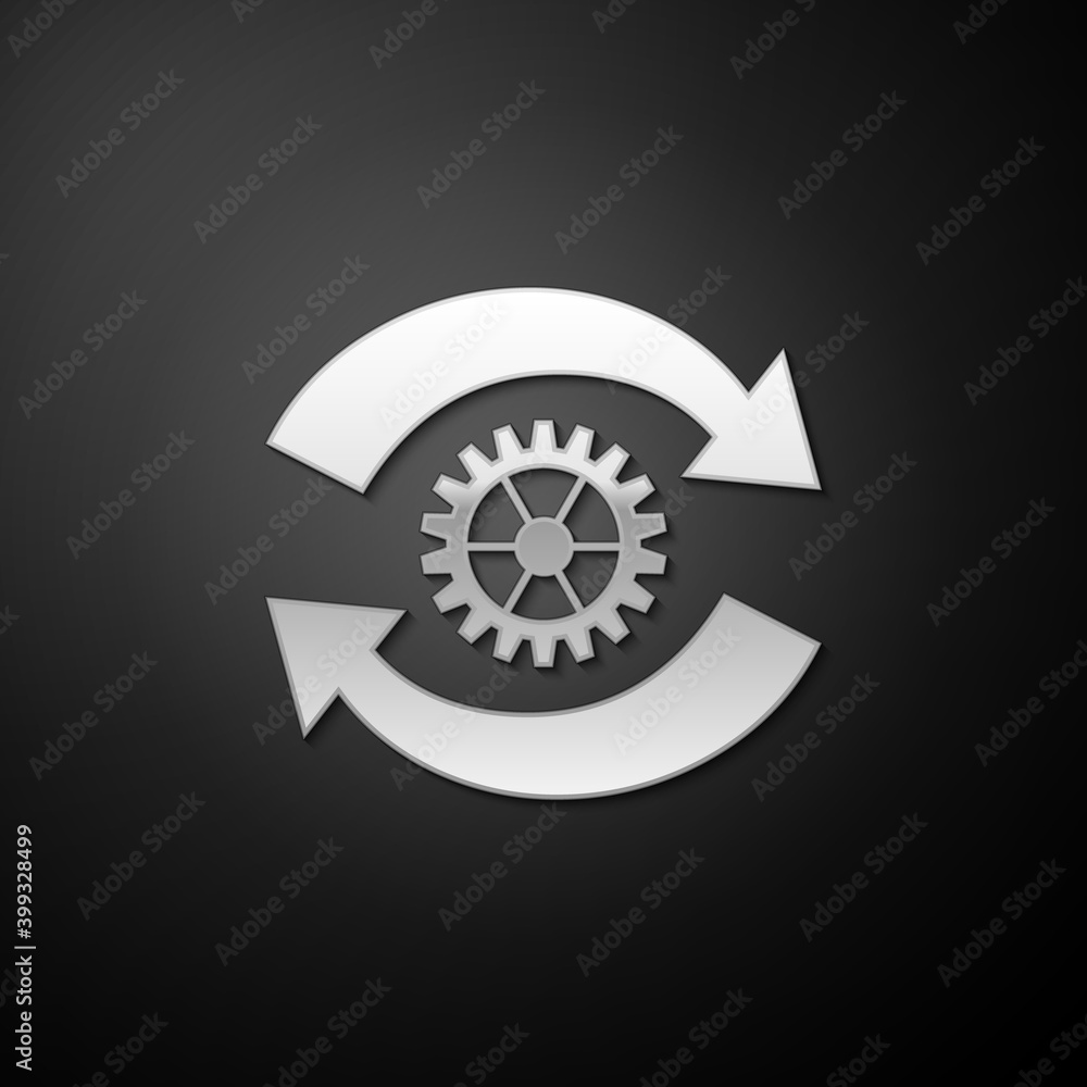 Silver Gear and arrows as workflow concept icon isolated on black background. Gear reload sign. Long shadow style. Vector. Silver Gear and arrows as workflow concept icon isolated on black background. Gear reload sign. Long shadow style. Vector.