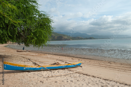 a traditional fisherman boat on the beach, Dili Timor Leste