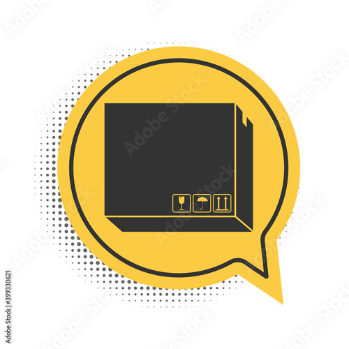Black Carton cardboard box with traffic symbols icon isolated on white background. Delivery and packaging. Transportation and shipping. Yellow speech bubble symbol. Vector.