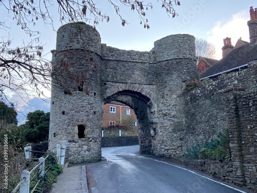 WINCHELSEA, EAST SUSSEX, UK - JULY 12th 2020 : The Landgate entrance arch to Winchelsea in East Sussex, dating from 1300 part of old town wall, Winchelsea, East Sussex, UK photo