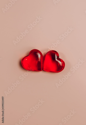 Valentines Day background with hearts over beige background. Top view. Flat lay © juliamikhaylova
