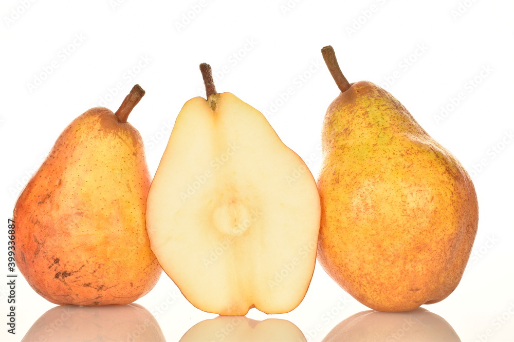 One half and two whole organic red pears, close-up, isolated on white. One half and two whole organic red pears, close-up, isolated on white.