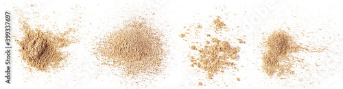 Set ground, milled nutmeg powder isolated on white background and texture, top view 