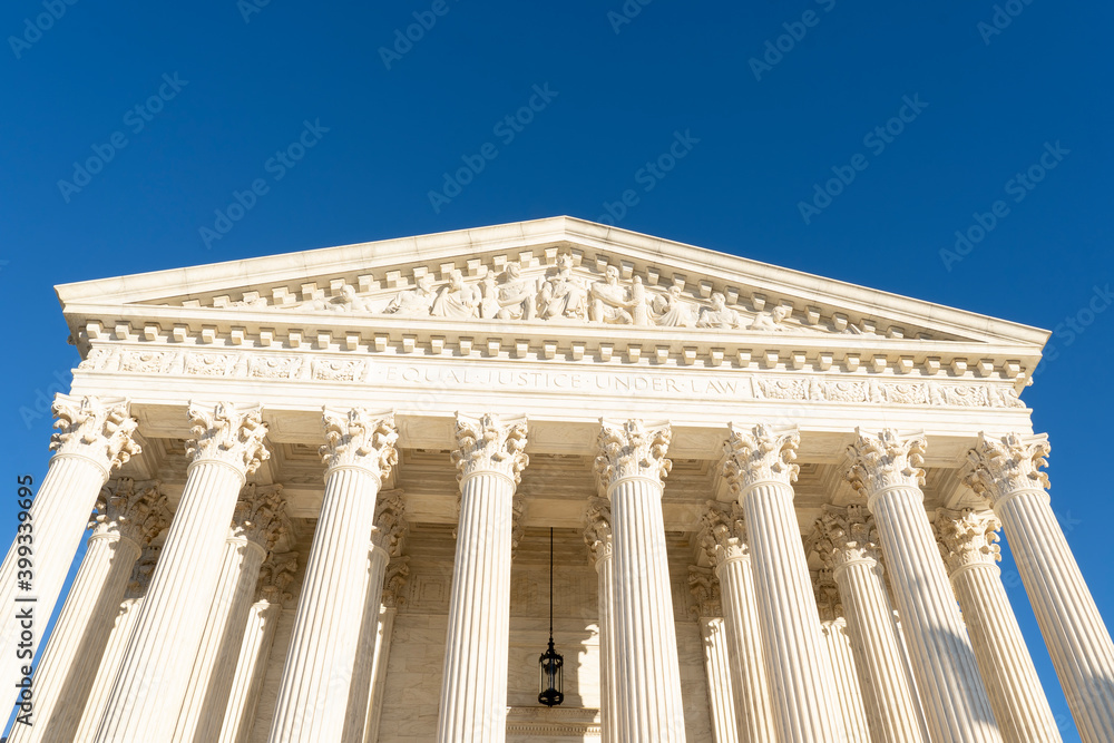 Washington D.C., USA - January 12, 2020: United States Supreme Court Building in Washington D.C., USA. The Supreme Court Building houses the Supreme Court of the United States. Washington D.C., USA - January 12, 2020: United States Supreme Court Building in Washington D.C., USA. The Supreme Court Building houses the Supreme Court of the United States.