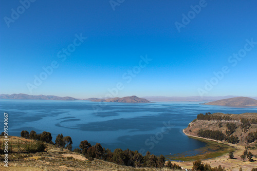 Lake Titicaca, Lago Titicaca, a freshwater lake in the Andes on the border of Bolivia and Peru, often called the "highest navigable lake" in the world