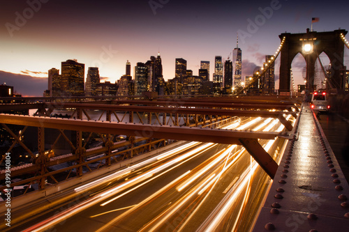 Brooklyn Bridge in New York City Long exposure with skyline in background at dusk