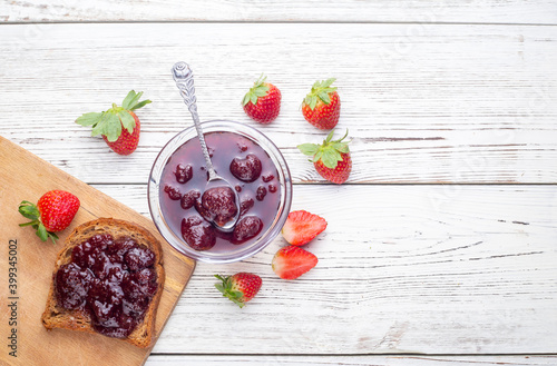 Bowl of strawberry jam isol...