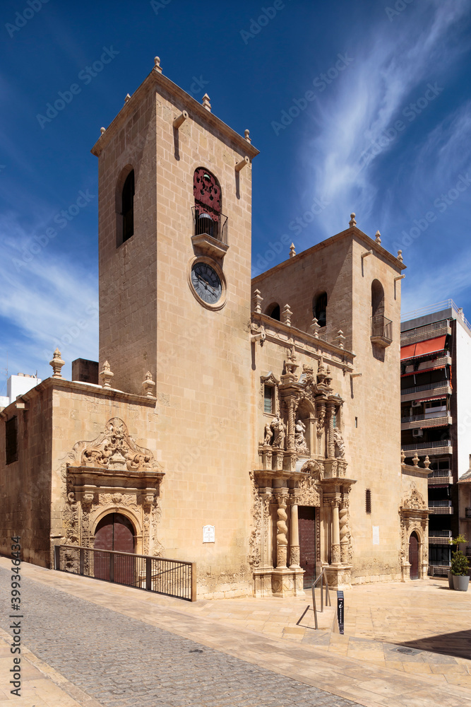 Vertical view of Basilica of Santa Maria in Alicante, Spain on a clear sunny day. It is the oldest active church in the location, built-in Valencian Gothic style between the 14th and 16th centuries