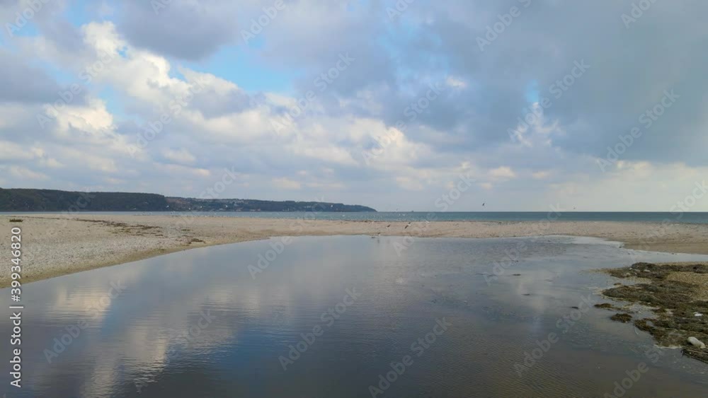waves coming fast to the beach, waves in winter day waves coming fast to the beach, waves in winter day