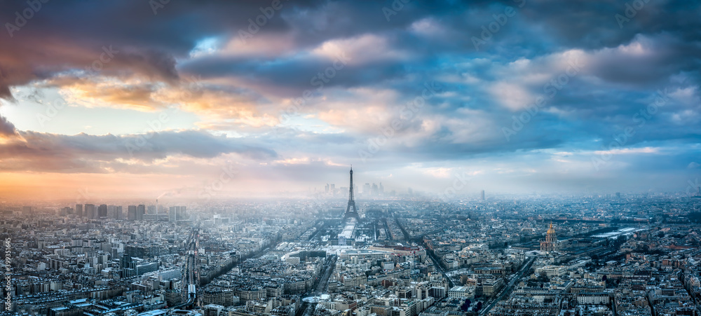 Paris skyline panorama in winter with view of the Eiffel Tower at sunset