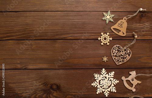 Christmas wooden toys on a wooden background top view