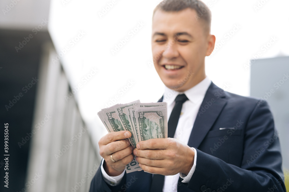 World economic crisis. Businessman Counting Money Usd Bills Payday. Total unemployment in a pandemic. Bribe. Dirty money. Successful business. Symbol of success, gain, victory World economic crisis. Businessman Counting Money Usd Bills Payday. Total unemployment in a pandemic. Bribe. Dirty money. Successful business. Symbol of success, gain, victory